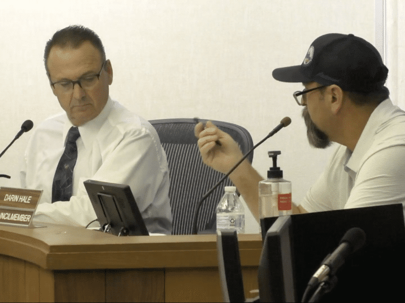Council members Darin Hale (left) and Mike Gallagher (right) at the Sept. 2 city council meeting.
